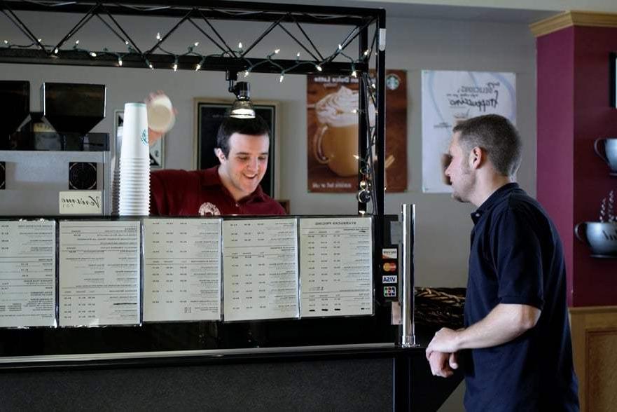 student working at Starbucks